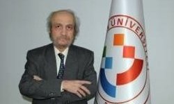 Üniversitenin lojmanında ölü bulundu