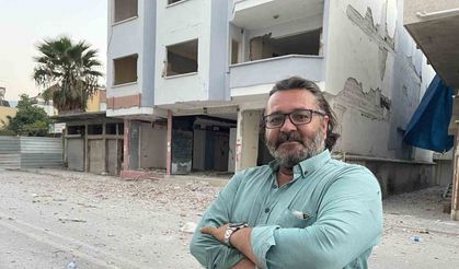 Yıkım için 11 katlı binanın üzerine 10 tonluk iş makinesi çıkarıldı