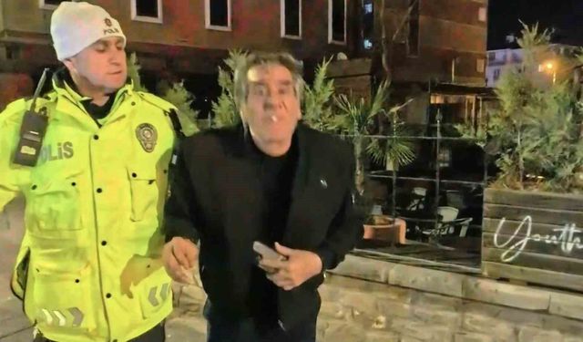 2.14 promil alkolle yakalandı: Gazeteciye el sallayıp yüzüne tükürdü