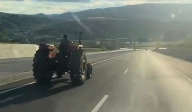 80 kilometre hızla giden aracı sollayan traktör sürücüsü kamerada